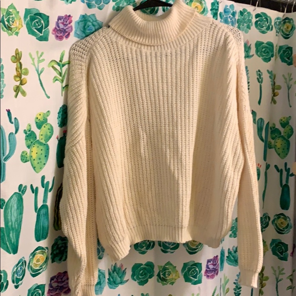 Turtleneck sweater.